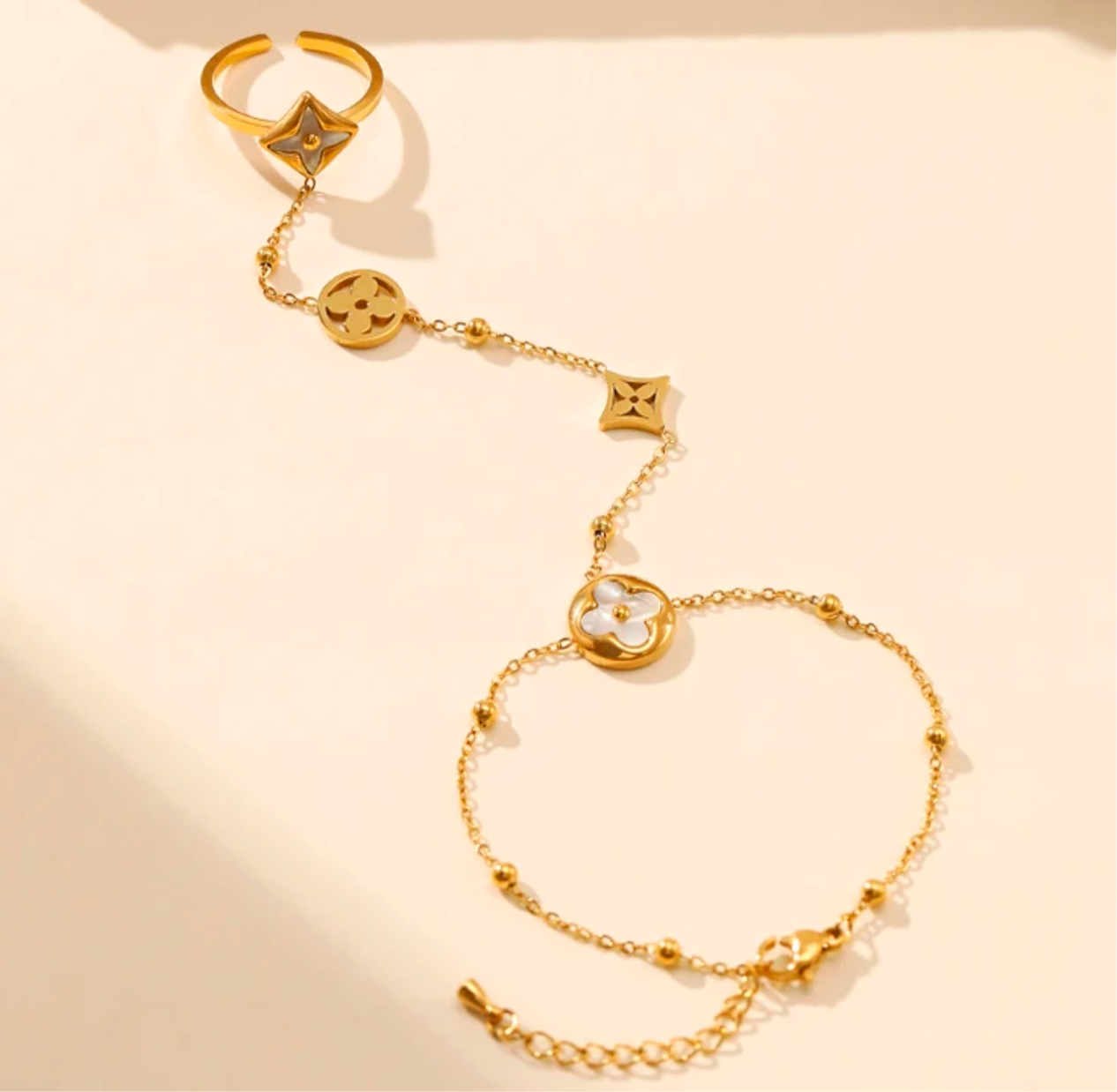 Ring with bracelet