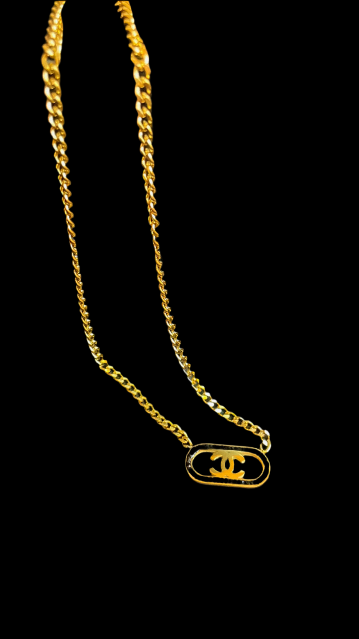 Golden necklace with black stones