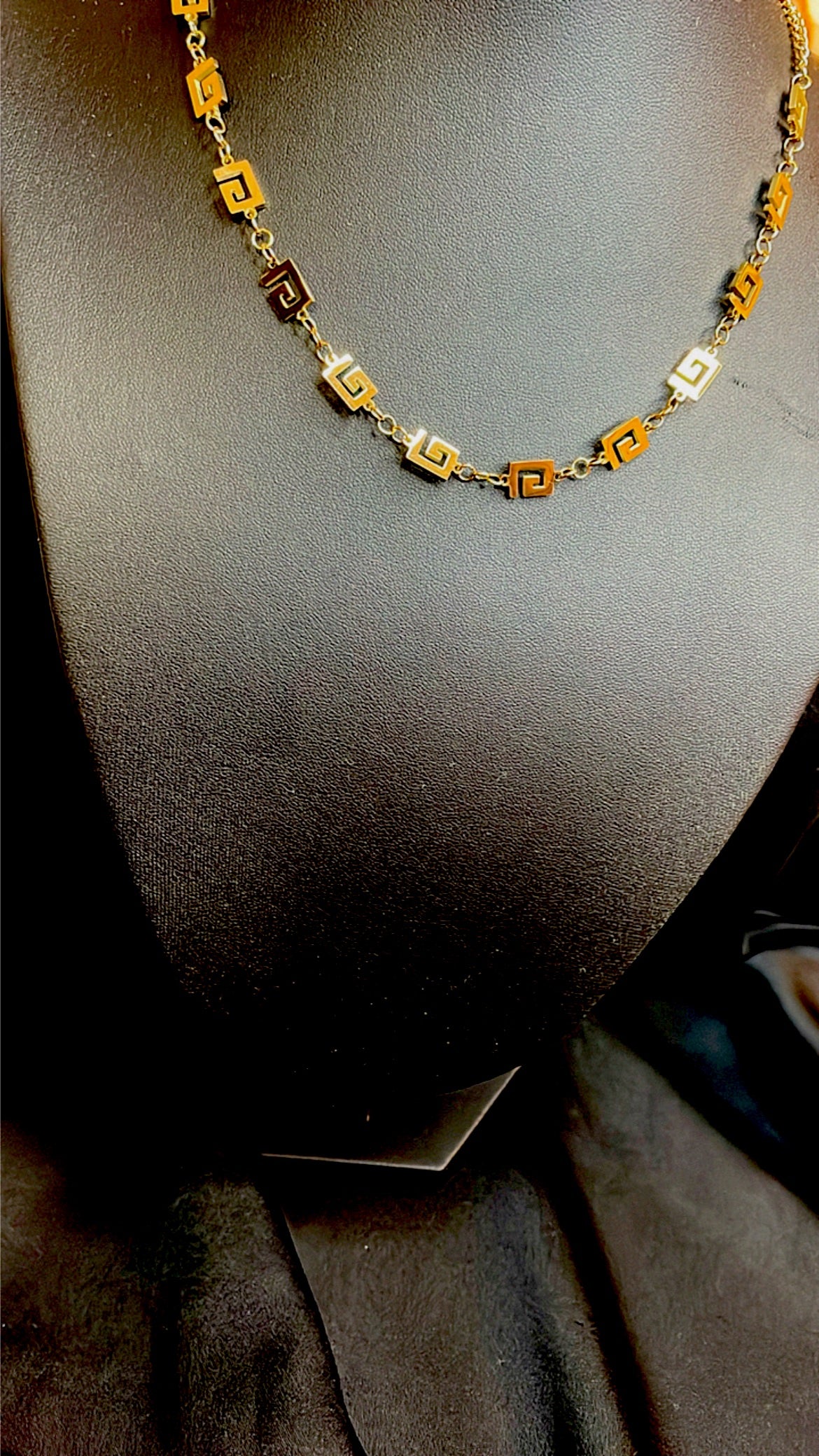The necklace looks like real gold