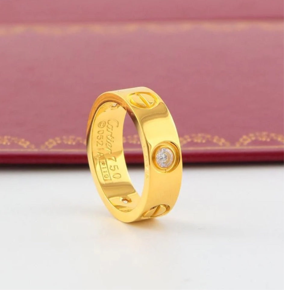 Gold color ring with diamonds