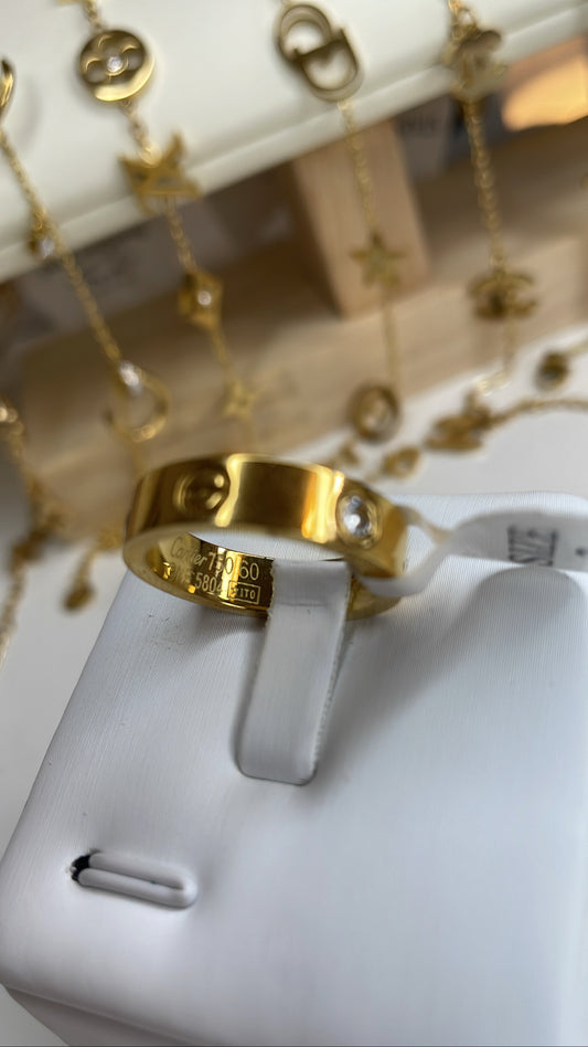 Gold color ring with diamonds